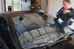 Professional edge cutting and shrinking preparation of the front window film